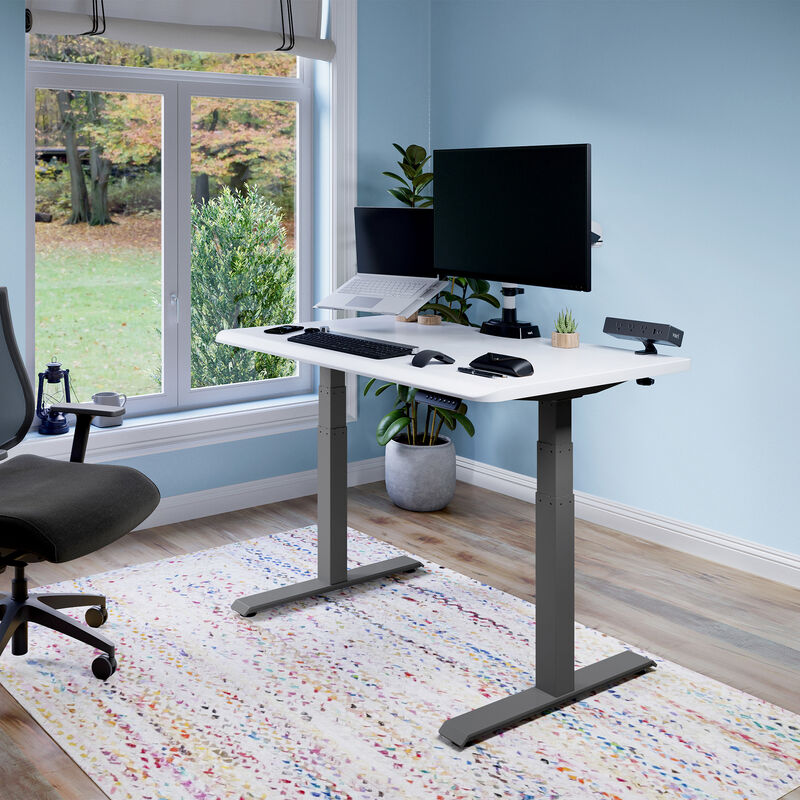 Electric Standing Desk with ComfortEdge in 48x30 White Slate in raised position at home image number null